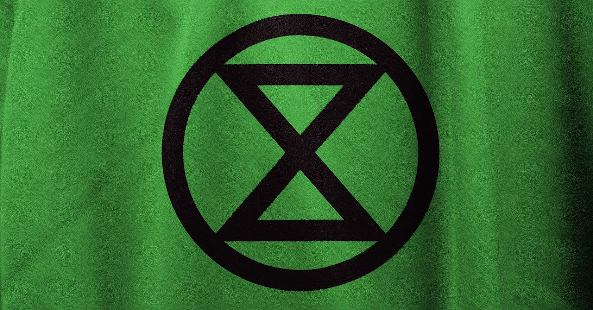 extinction rebellion flag Image by Pete Linforth from Pixabay